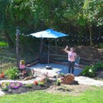 Amanda waving from her new patio